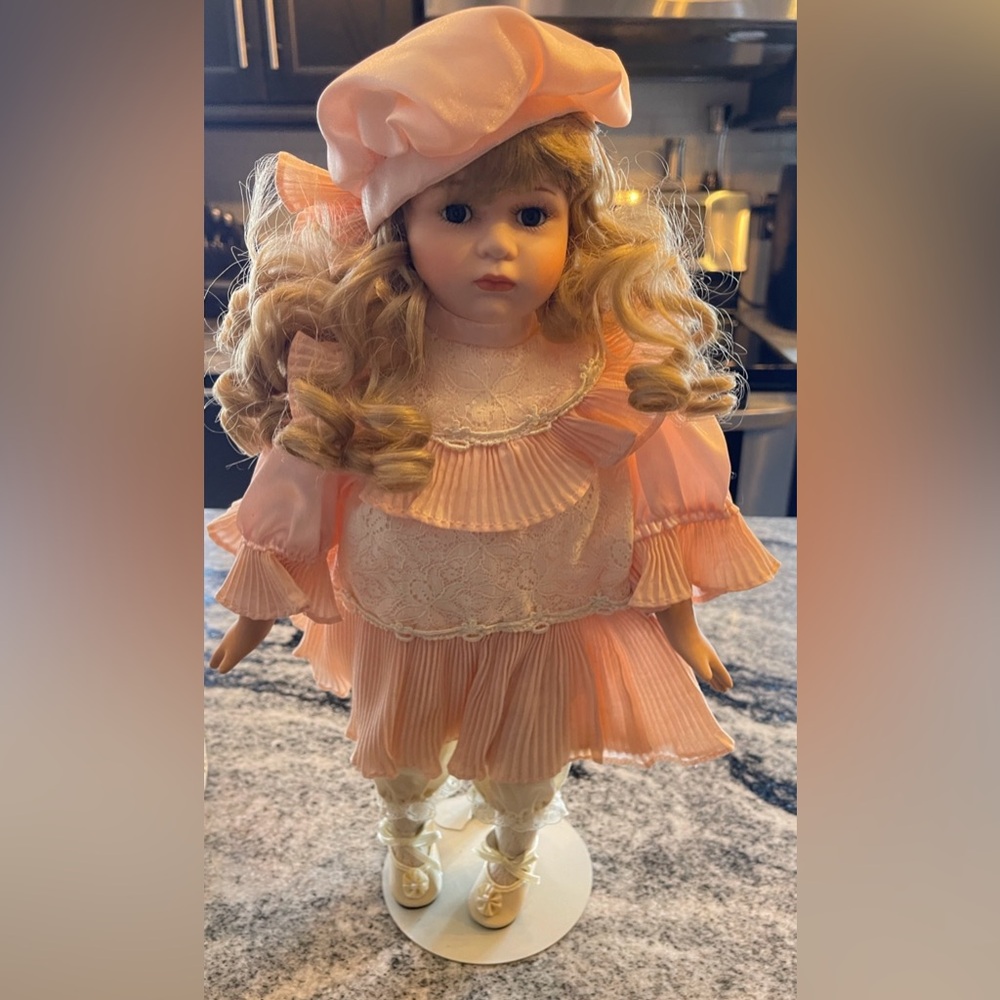 Elegant Pink Doll with Ruffled Dress